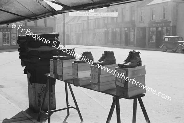 BOOTS FOR SALE ON MARKET STALL